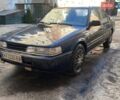 Синий Мазда 626, объемом двигателя 1.8 л и пробегом 300 тыс. км за 1500 $, фото 1 на Automoto.ua