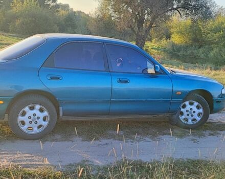 Синій Мазда 626, об'ємом двигуна 2 л та пробігом 442 тис. км за 600 $, фото 3 на Automoto.ua