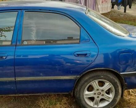 Синий Мазда 626, объемом двигателя 2 л и пробегом 300 тыс. км за 1100 $, фото 2 на Automoto.ua