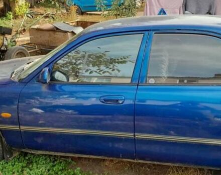 Синий Мазда 626, объемом двигателя 2 л и пробегом 300 тыс. км за 1100 $, фото 3 на Automoto.ua