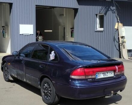 Синій Мазда 626, об'ємом двигуна 1.8 л та пробігом 445 тис. км за 1250 $, фото 2 на Automoto.ua