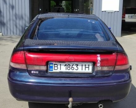 Синій Мазда 626, об'ємом двигуна 1.8 л та пробігом 445 тис. км за 1250 $, фото 4 на Automoto.ua