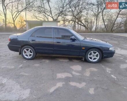 Синий Мазда 626, объемом двигателя 2 л и пробегом 515 тыс. км за 1999 $, фото 7 на Automoto.ua