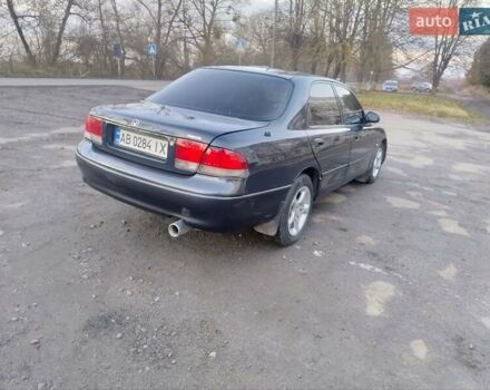 Синий Мазда 626, объемом двигателя 2 л и пробегом 515 тыс. км за 1999 $, фото 5 на Automoto.ua