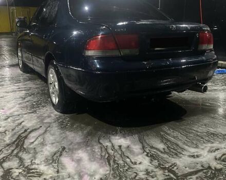 Синий Мазда 626, объемом двигателя 2 л и пробегом 514 тыс. км за 1750 $, фото 4 на Automoto.ua