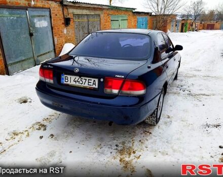 Синій Мазда 626, об'ємом двигуна 2 л та пробігом 405 тис. км за 2500 $, фото 4 на Automoto.ua