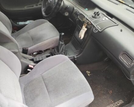 Синий Мазда 626, объемом двигателя 2 л и пробегом 400 тыс. км за 952 $, фото 9 на Automoto.ua