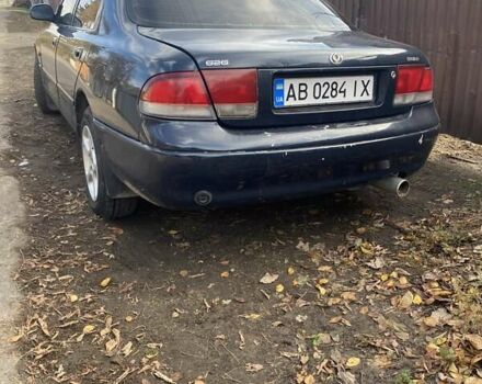 Синий Мазда 626, объемом двигателя 2 л и пробегом 514 тыс. км за 1950 $, фото 4 на Automoto.ua