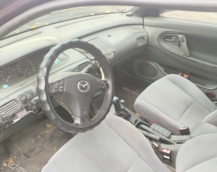 Синий Мазда 626, объемом двигателя 2 л и пробегом 400 тыс. км за 952 $, фото 7 на Automoto.ua