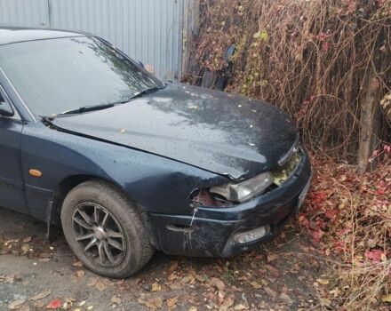 Синий Мазда 626, объемом двигателя 2 л и пробегом 400 тыс. км за 952 $, фото 1 на Automoto.ua