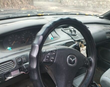 Синий Мазда 626, объемом двигателя 2 л и пробегом 400 тыс. км за 952 $, фото 6 на Automoto.ua