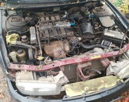 Синий Мазда 626, объемом двигателя 2 л и пробегом 400 тыс. км за 952 $, фото 8 на Automoto.ua