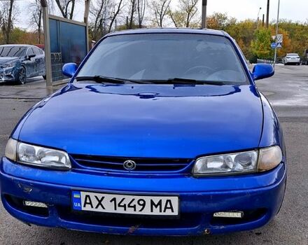 Синий Мазда 626, объемом двигателя 1.8 л и пробегом 461 тыс. км за 1700 $, фото 2 на Automoto.ua