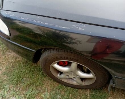 Синий Мазда 626, объемом двигателя 2 л и пробегом 450 тыс. км за 1999 $, фото 4 на Automoto.ua