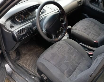 Синий Мазда 626, объемом двигателя 2 л и пробегом 450 тыс. км за 1999 $, фото 5 на Automoto.ua