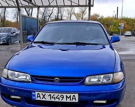 Синий Мазда 626, объемом двигателя 1.8 л и пробегом 461 тыс. км за 1700 $, фото 1 на Automoto.ua