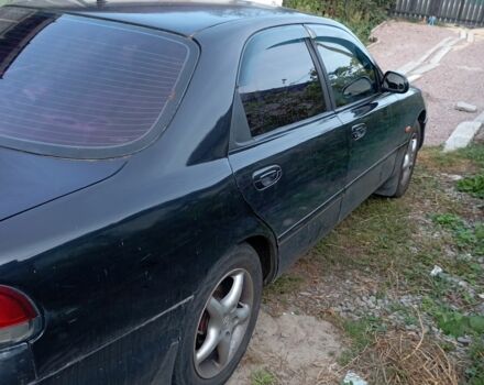 Синий Мазда 626, объемом двигателя 2 л и пробегом 450 тыс. км за 1999 $, фото 2 на Automoto.ua