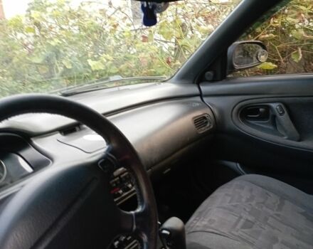 Синий Мазда 626, объемом двигателя 2 л и пробегом 450 тыс. км за 1999 $, фото 6 на Automoto.ua