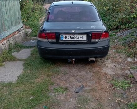 Синий Мазда 626, объемом двигателя 2 л и пробегом 450 тыс. км за 1999 $, фото 1 на Automoto.ua