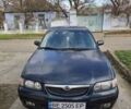 Синий Мазда 626, объемом двигателя 2 л и пробегом 305 тыс. км за 2300 $, фото 1 на Automoto.ua