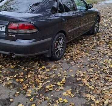 Синий Мазда 626, объемом двигателя 1.84 л и пробегом 300 тыс. км за 2700 $, фото 3 на Automoto.ua