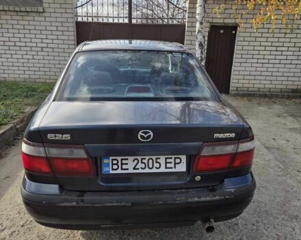 Синий Мазда 626, объемом двигателя 2 л и пробегом 300 тыс. км за 2300 $, фото 3 на Automoto.ua