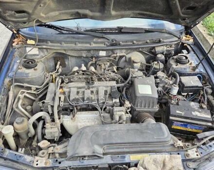 Синий Мазда 626, объемом двигателя 2 л и пробегом 305 тыс. км за 2300 $, фото 6 на Automoto.ua