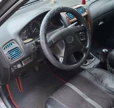 Синий Мазда 626, объемом двигателя 1.84 л и пробегом 300 тыс. км за 2700 $, фото 5 на Automoto.ua