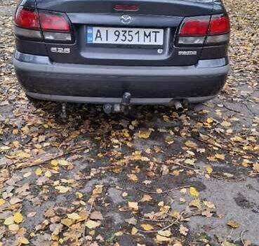 Синий Мазда 626, объемом двигателя 1.84 л и пробегом 300 тыс. км за 2700 $, фото 2 на Automoto.ua