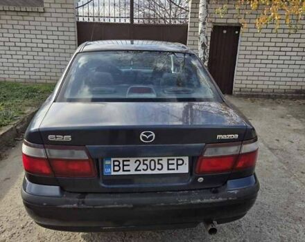 Синий Мазда 626, объемом двигателя 2 л и пробегом 305 тыс. км за 2300 $, фото 1 на Automoto.ua