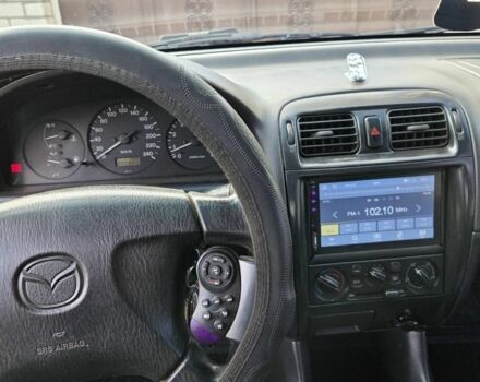 Синий Мазда 626, объемом двигателя 2 л и пробегом 300 тыс. км за 2300 $, фото 4 на Automoto.ua