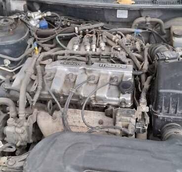 Синий Мазда 626, объемом двигателя 1.84 л и пробегом 300 тыс. км за 2700 $, фото 4 на Automoto.ua