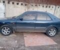 Синій Мазда 626, об'ємом двигуна 2 л та пробігом 495 тис. км за 1502 $, фото 1 на Automoto.ua