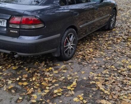 Синий Мазда 626, объемом двигателя 1.8 л и пробегом 1000 тыс. км за 2800 $, фото 3 на Automoto.ua