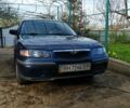 Синій Мазда 626, об'ємом двигуна 2 л та пробігом 222 тис. км за 4400 $, фото 1 на Automoto.ua