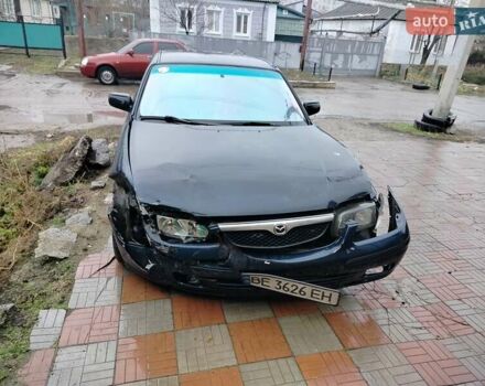 Синий Мазда 626, объемом двигателя 2 л и пробегом 320 тыс. км за 1500 $, фото 11 на Automoto.ua