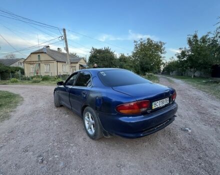 Синий Мазда 626, объемом двигателя 2 л и пробегом 230 тыс. км за 1250 $, фото 4 на Automoto.ua