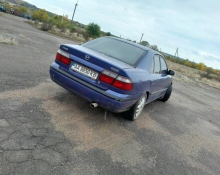 Синий Мазда 626, объемом двигателя 2 л и пробегом 240 тыс. км за 2000 $, фото 3 на Automoto.ua