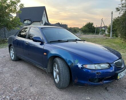 Синий Мазда 626, объемом двигателя 2 л и пробегом 230 тыс. км за 1250 $, фото 1 на Automoto.ua