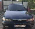 Синий Мазда 626, объемом двигателя 2 л и пробегом 290 тыс. км за 3500 $, фото 1 на Automoto.ua