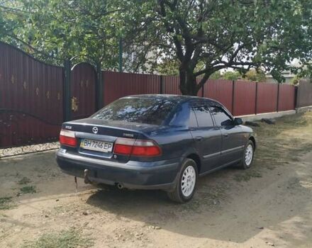 Синій Мазда 626, об'ємом двигуна 2 л та пробігом 222 тис. км за 4400 $, фото 6 на Automoto.ua