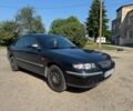 Синий Мазда 626, объемом двигателя 1.8 л и пробегом 200 тыс. км за 1556 $, фото 1 на Automoto.ua