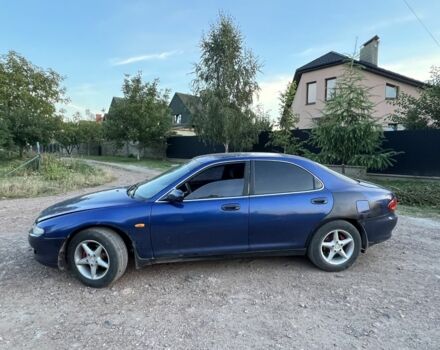 Синий Мазда 626, объемом двигателя 2 л и пробегом 230 тыс. км за 1250 $, фото 5 на Automoto.ua