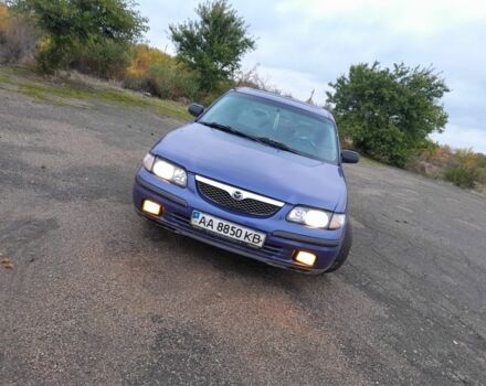 Синий Мазда 626, объемом двигателя 2 л и пробегом 240 тыс. км за 2000 $, фото 1 на Automoto.ua