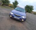 Синий Мазда 626, объемом двигателя 2 л и пробегом 240 тыс. км за 2000 $, фото 1 на Automoto.ua