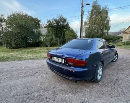 Синий Мазда 626, объемом двигателя 2 л и пробегом 230 тыс. км за 1250 $, фото 3 на Automoto.ua