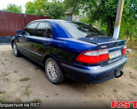 Синий Мазда 626, объемом двигателя 1.8 л и пробегом 88 тыс. км за 1750 $, фото 5 на Automoto.ua