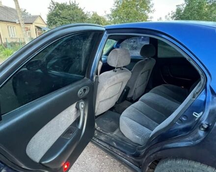 Синий Мазда 626, объемом двигателя 2 л и пробегом 100 тыс. км за 1500 $, фото 4 на Automoto.ua