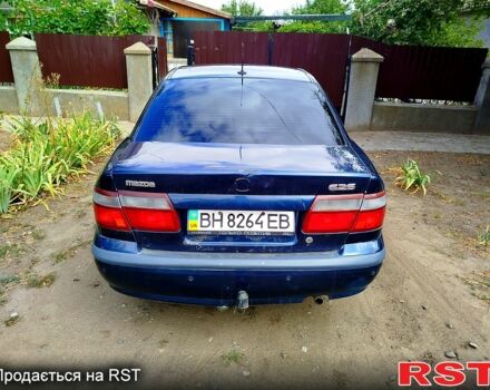 Синий Мазда 626, объемом двигателя 1.8 л и пробегом 88 тыс. км за 1750 $, фото 4 на Automoto.ua