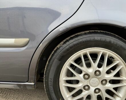 Синий Мазда 626, объемом двигателя 1.8 л и пробегом 247 тыс. км за 2000 $, фото 4 на Automoto.ua